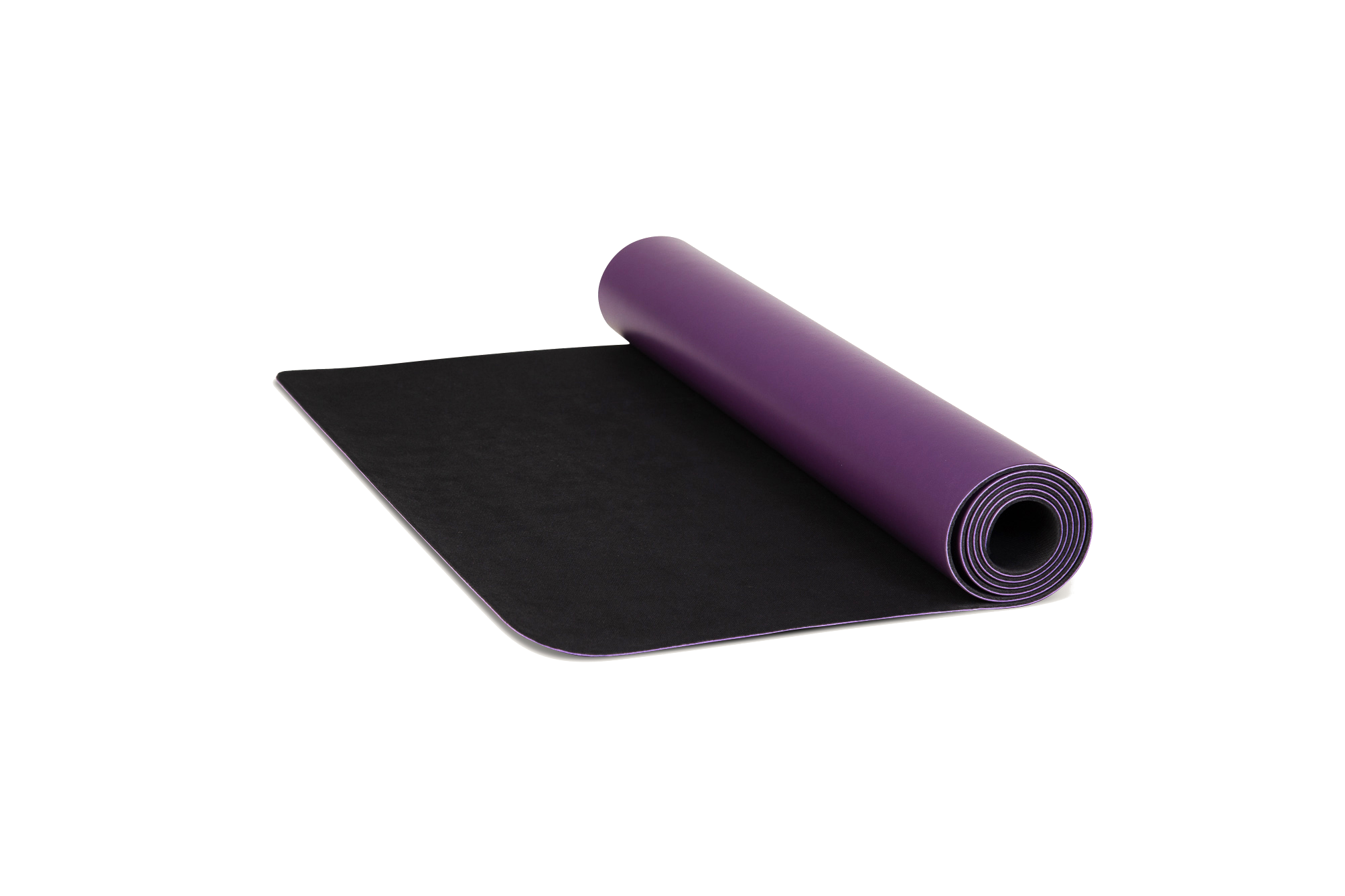 Eco-friendly purple yoga mat unrolling made from natural tree rubber.